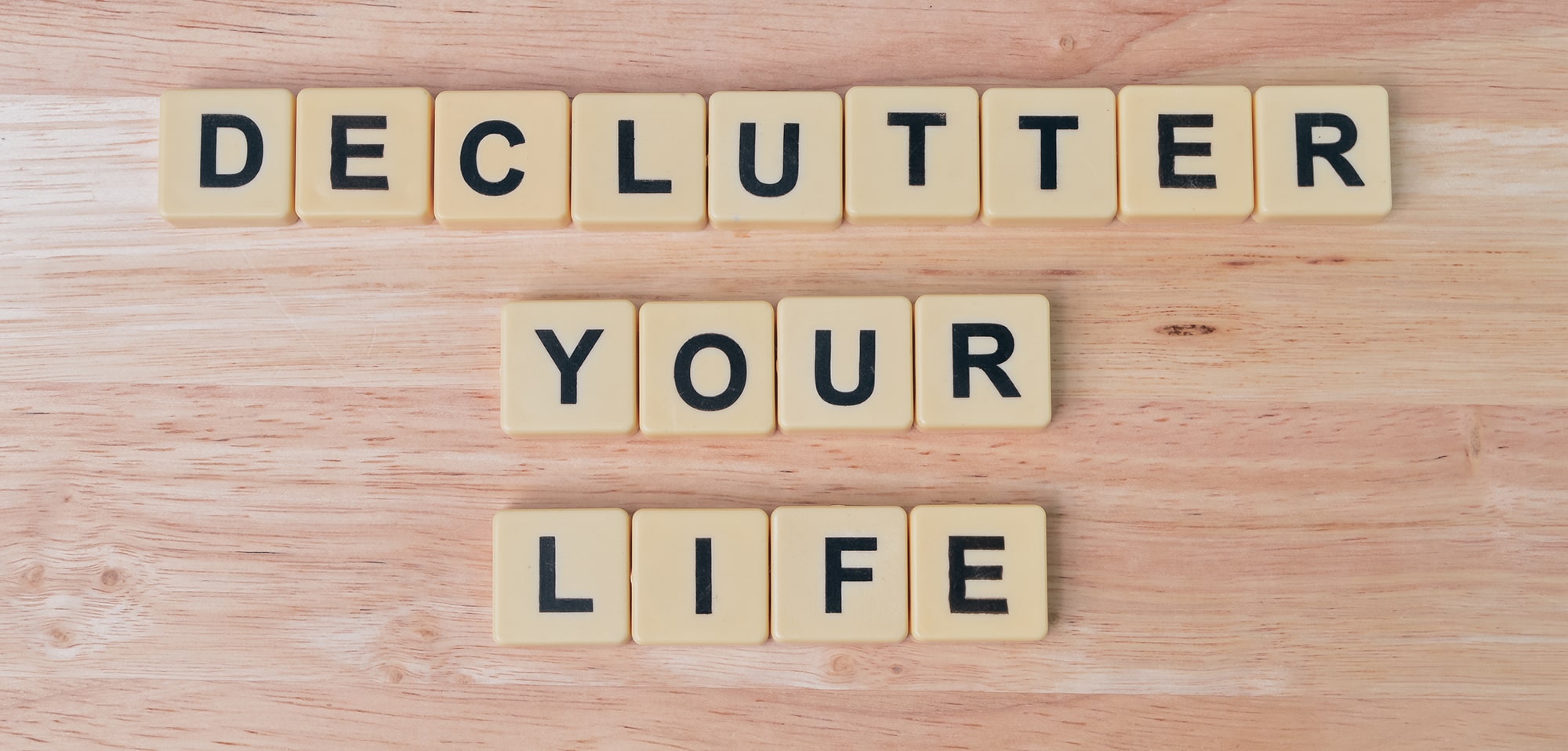 "Declutter your life" spelt with wooden blocks